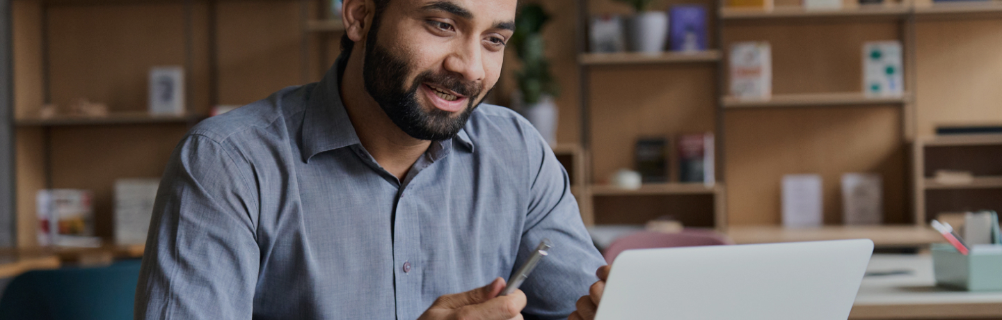 Person in office using a laptop